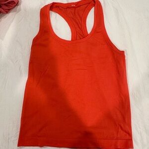 Red lululemon swiftly tech tank top